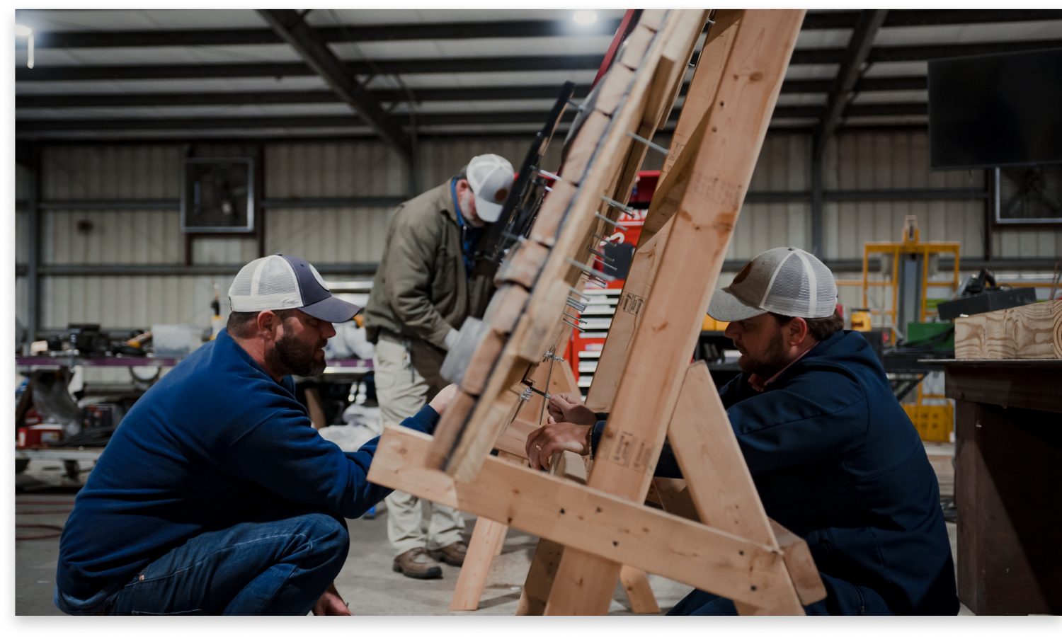 whitfield sign emplyees working in our warehouse